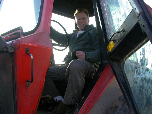Greg running the tractor
