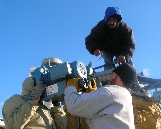 Taking apart the old digester in the field