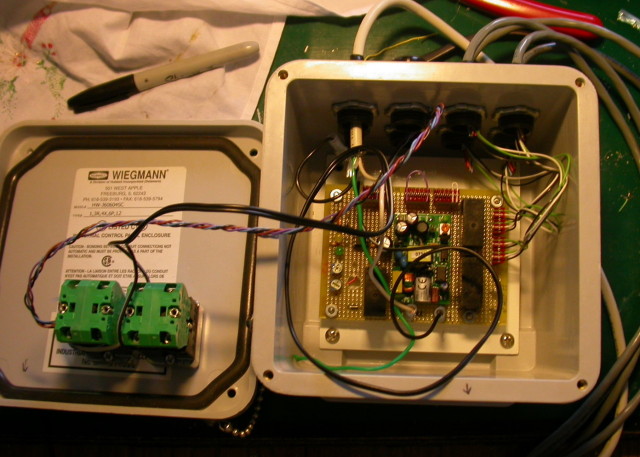 Inside the control box for the pump