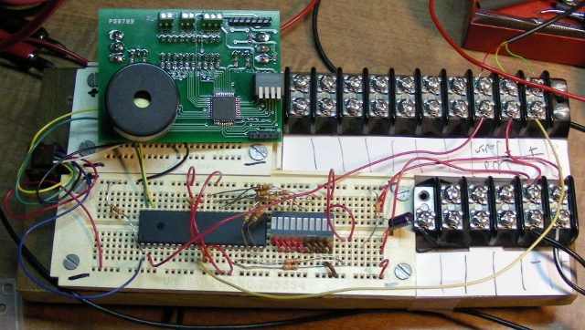 Finished V1 PCB next to original breadboard prototype